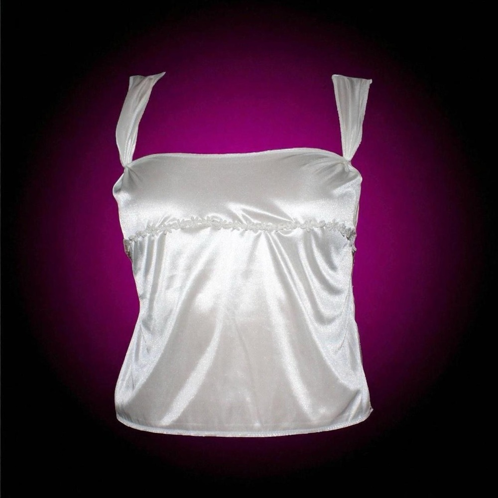Silky ivory satin top with lace ties and floral trim